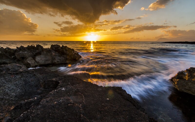 Sunset over Rocky Shore — Gold, Dramatic