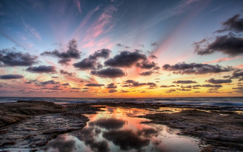 Sunset over Rocky Shore — Orange, Dramatic, Photograph, Clouds, Ocean, Rocks