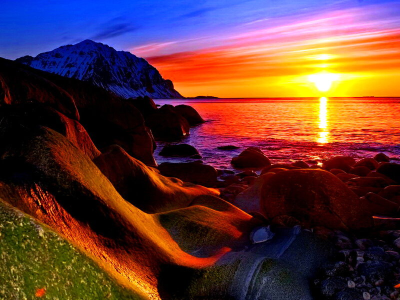 Sunset over Rocky Shore — Orange, Dramatic, Photograph, Mountain, Sea, Rocks