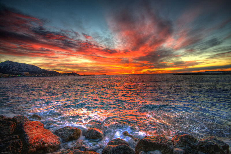 Sunset over Rocky Shore — Orange, Dramatic, Photograph, Mountain, Sea