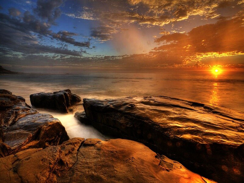 Sunset over Rocky Shore — Orange, Dramatic, Photograph, Ocean, Rocks, Clouds