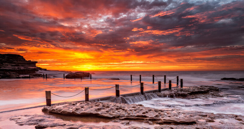 Sunset over Rocky Shore — Orange, Dramatic, Photograph, Rocks, Sea