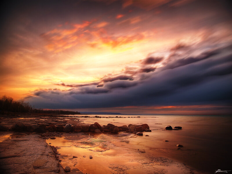 Sunset over Rocky Shore — Orange, Dramatic, Photograph, Rocks