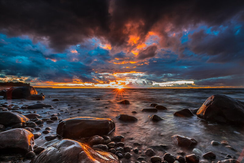 Sunset over Rocky Shore — Orange, Dramatic, Photograph, Sun, Clouds, Rocks
