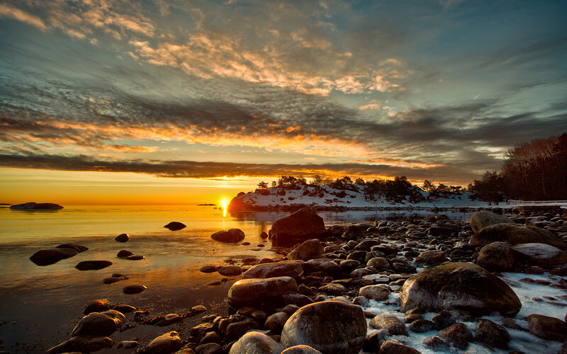 Sunset over Rocky Shore — Orange, Dramatic