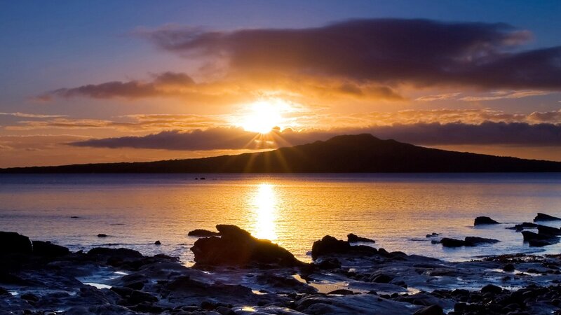 Sunset over Rocky Shore — Orange, Serene, Photograph, Mountain, Sea, Rocks, Clouds