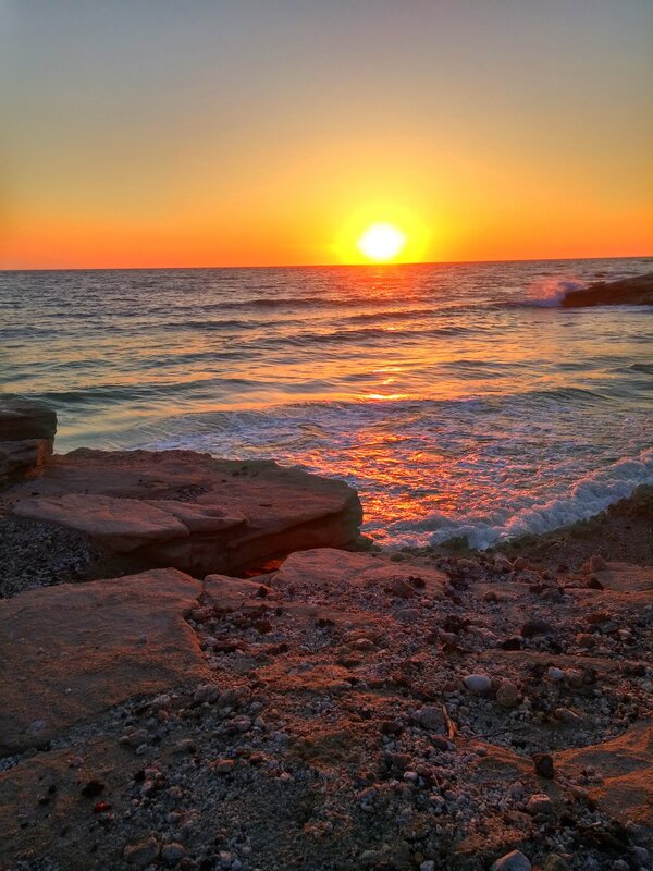 Sunset over Rocky Shore — Orange, Serene, Photograph, Ocean, Rocks, Sky