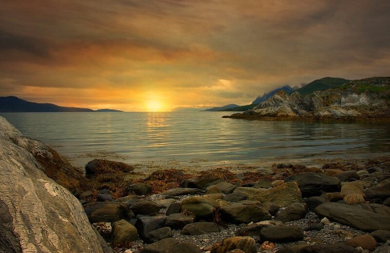 Sunset over Rocky Shore — Orange, Serene, Photograph, Sea, Mountains