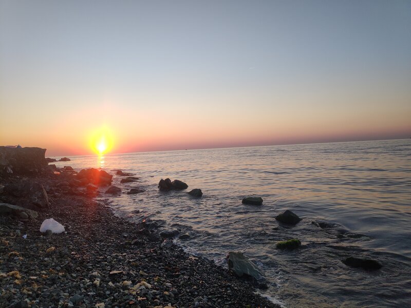 Sunset over Rocky Shore — Orange, Serene, Photograph, Sun, Sea, Rocks