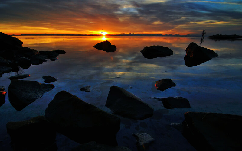 Sunset over Rocky Shore — Orange, Serene
