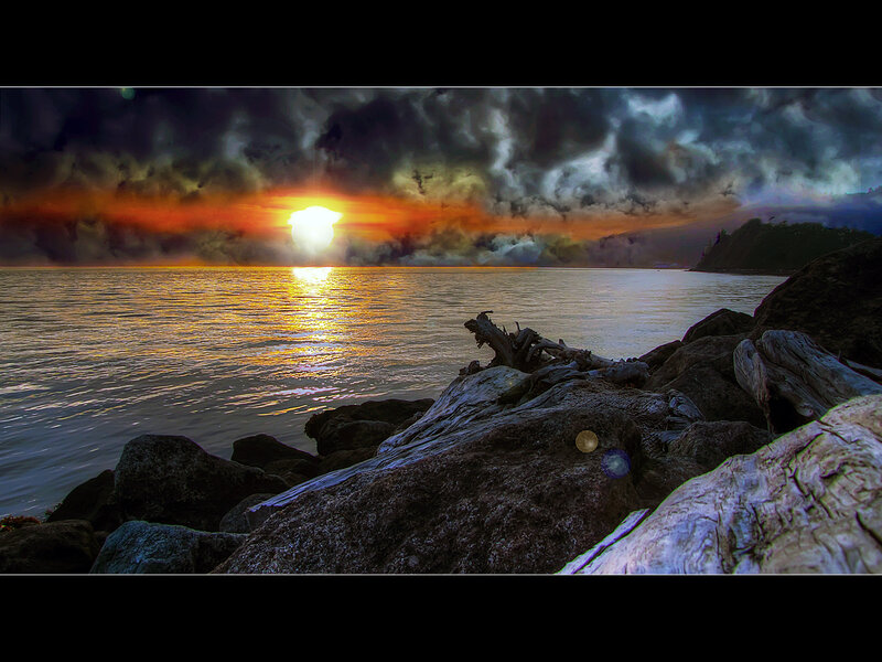 Sunset over Rocky Shore — Orange