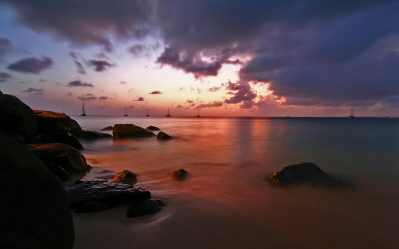 Sunset over Rocky Shore — Purple, Dramatic, Photograph, Boats, Clouds