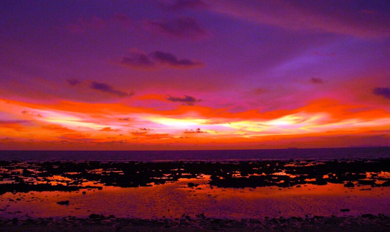 Sunset over Rocky Shore — Purple, Dramatic, Photograph, Sky