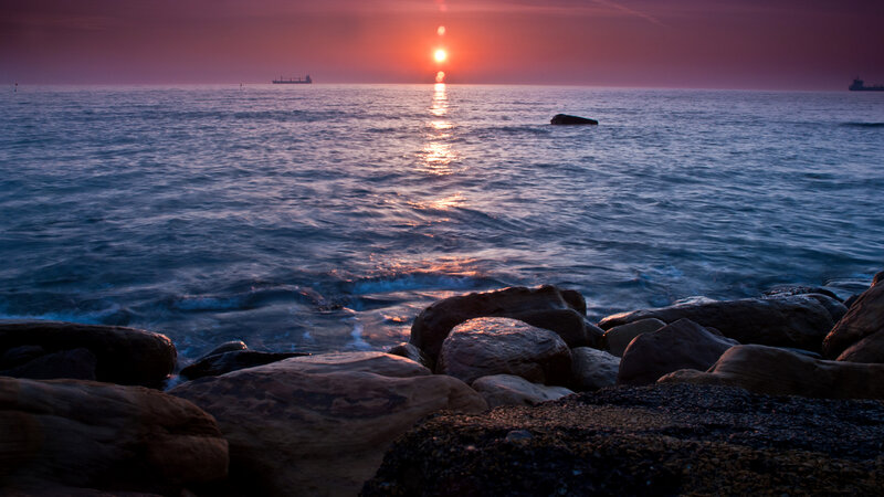 Sunset over Rocky Shore — Purple, Serene