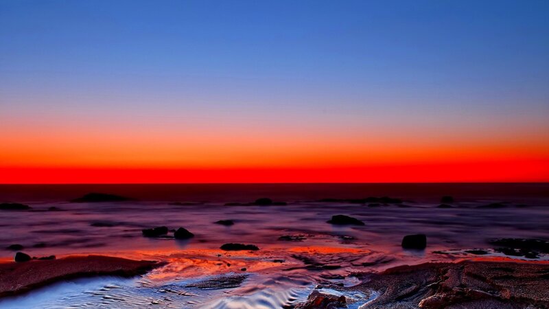 Sunset over Rocky Shore — Red, Dramatic, Photograph, Ocean, Rocks, Sky