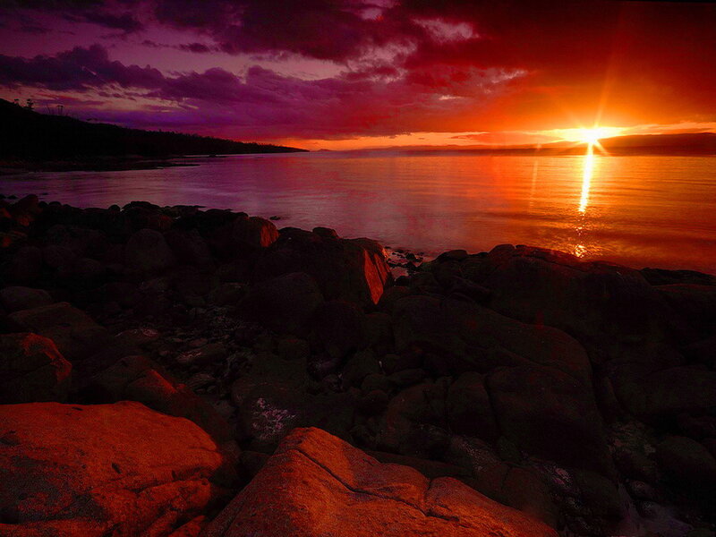 Sunset over Rocky Shore — Red, Dramatic, Photograph, Rocks