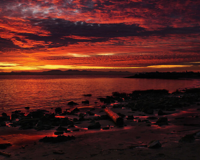 Sunset over Rocky Shore — Red, Dramatic