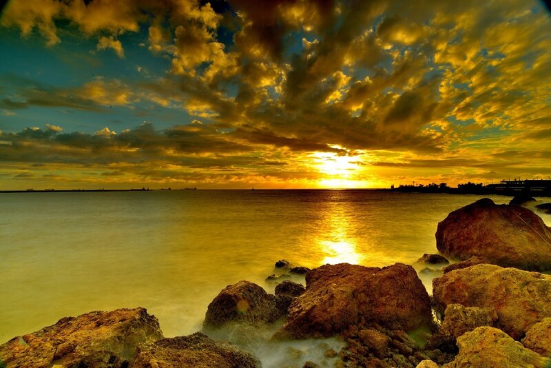Sunset over Rocky Shore — Yellow, Dramatic, Photograph, Rocks