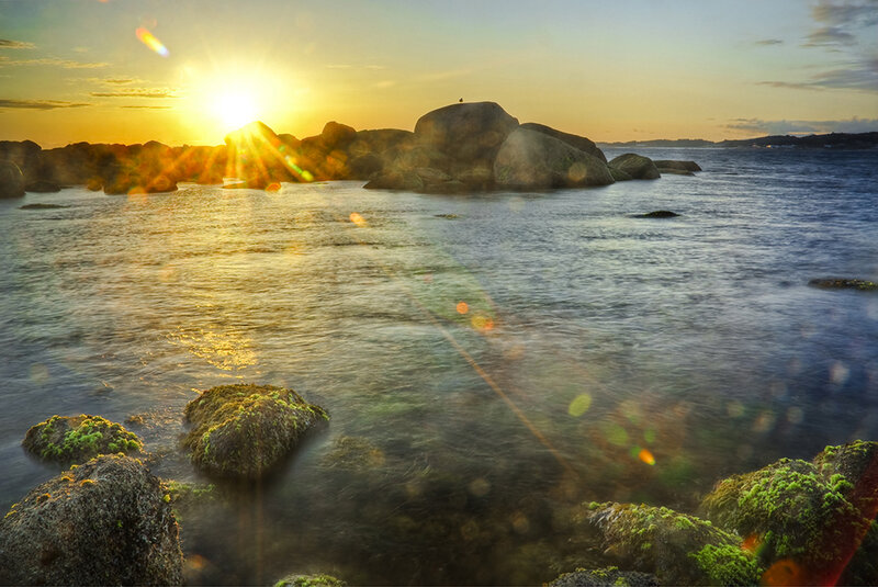 Sunset over Rocky Shore — Yellow, Serene, Photograph