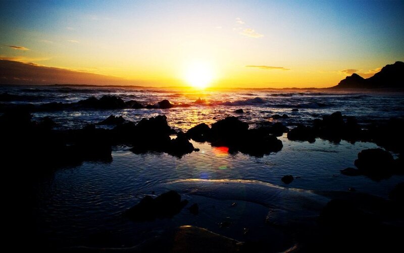 Sunset over Rocky Shore — Yellow, Serene