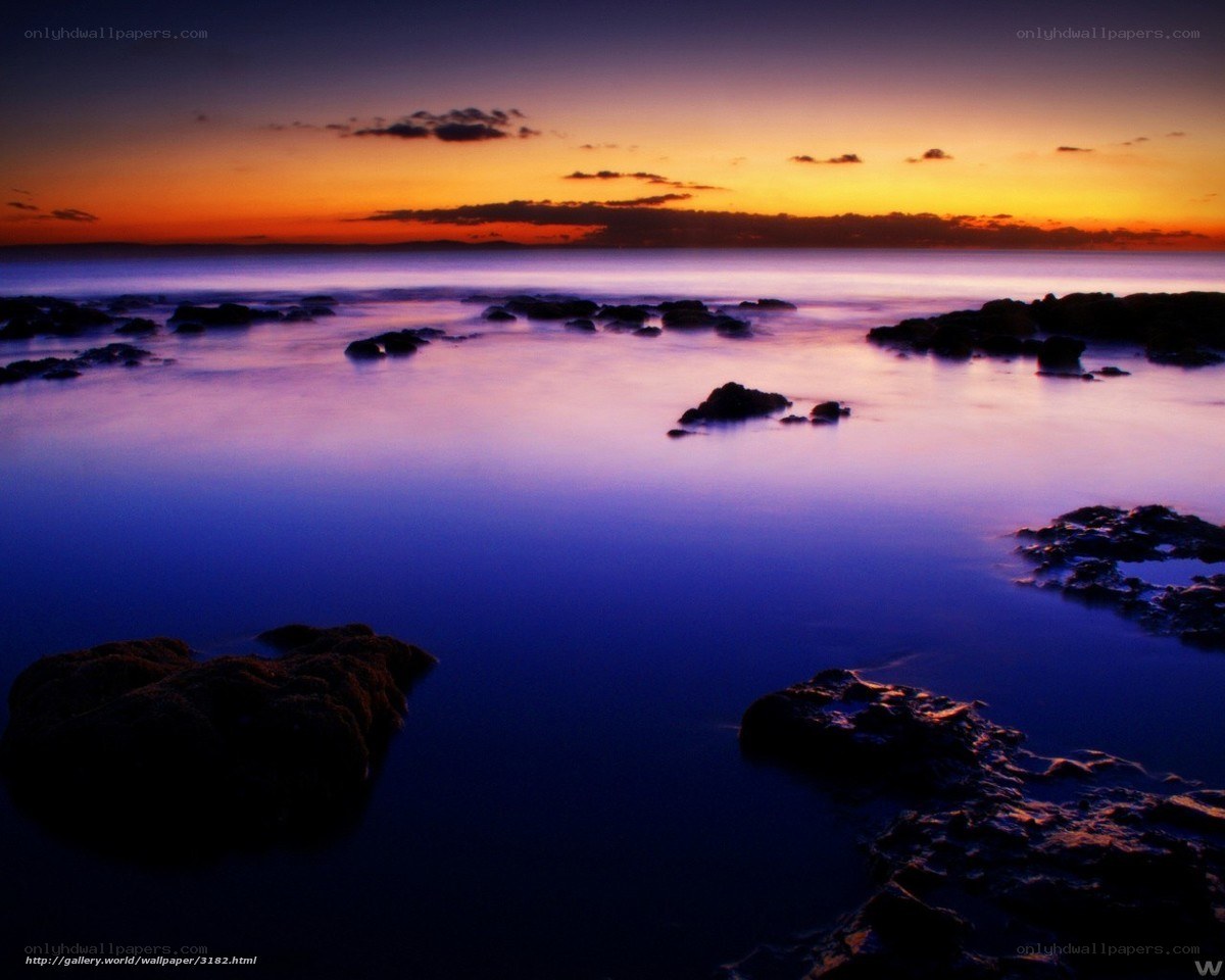 Sunset over rocky shore