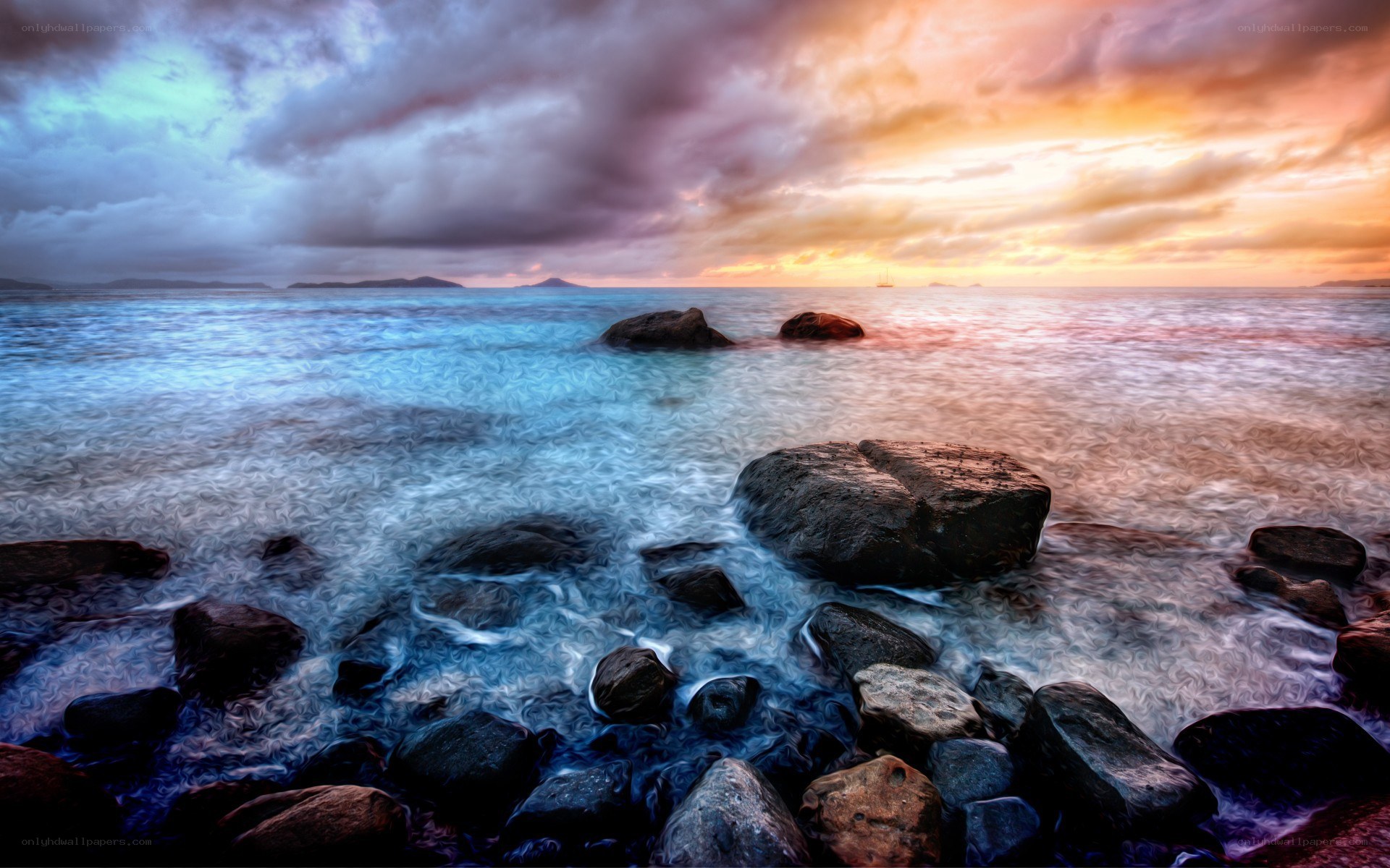 Sunset over rocky shoreline