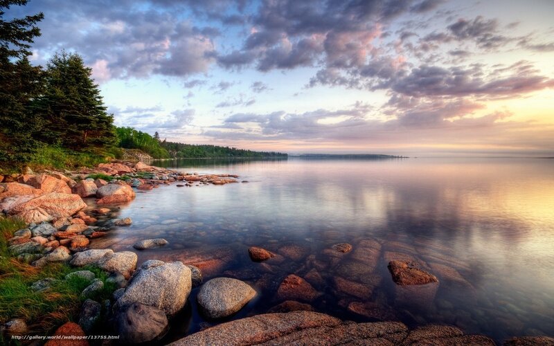 Sunset over rocky shoreline