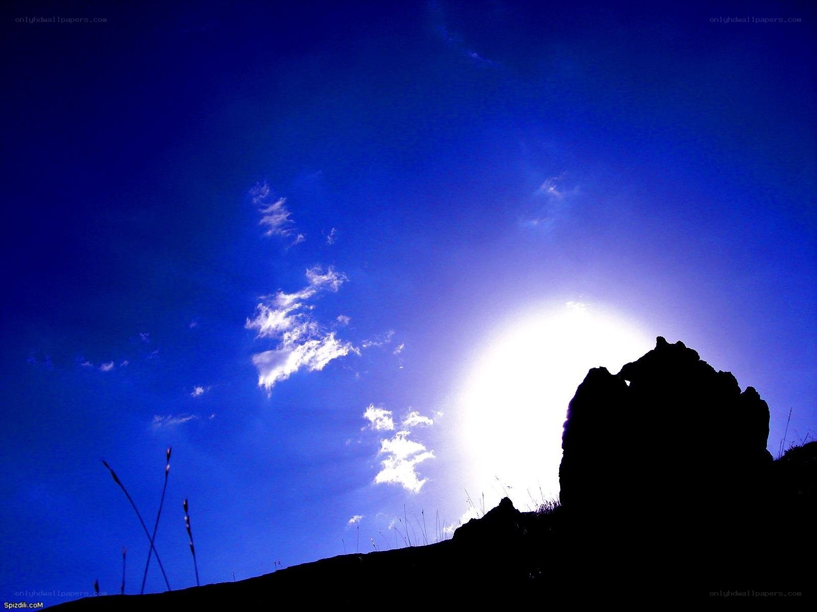 Sunset over rocky silhouette