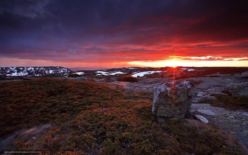 Sunset over Rocky Terrain — Red, Dramatic, Photograph