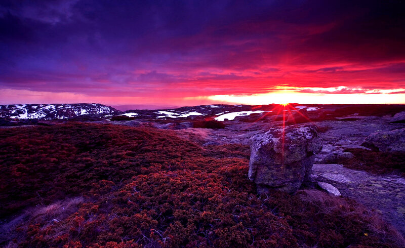 Sunset over Rocky Terrain — Red