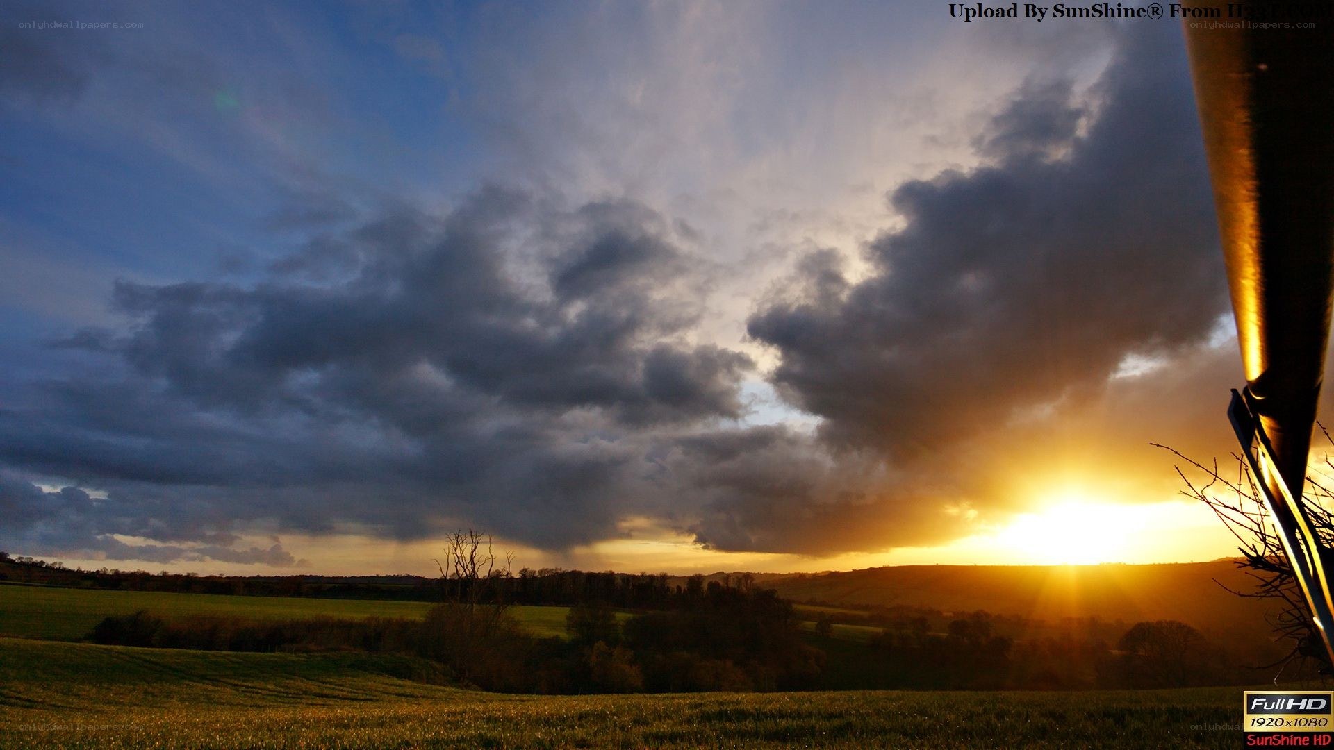 Sunset over rolling hills