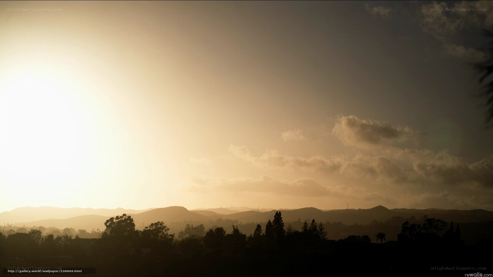 Sunset over rolling hills