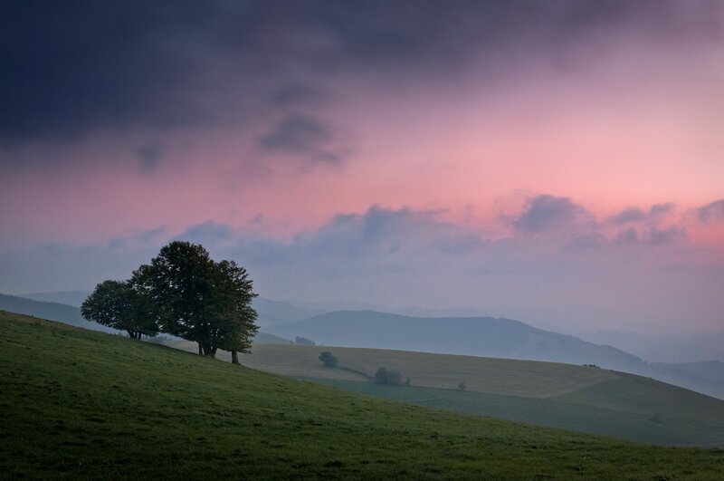 Sunset over rolling hills