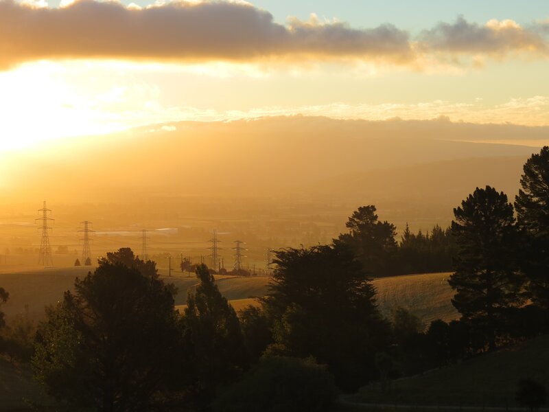 Sunset over rolling hills