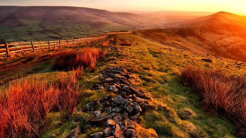 Sunset over rolling hills