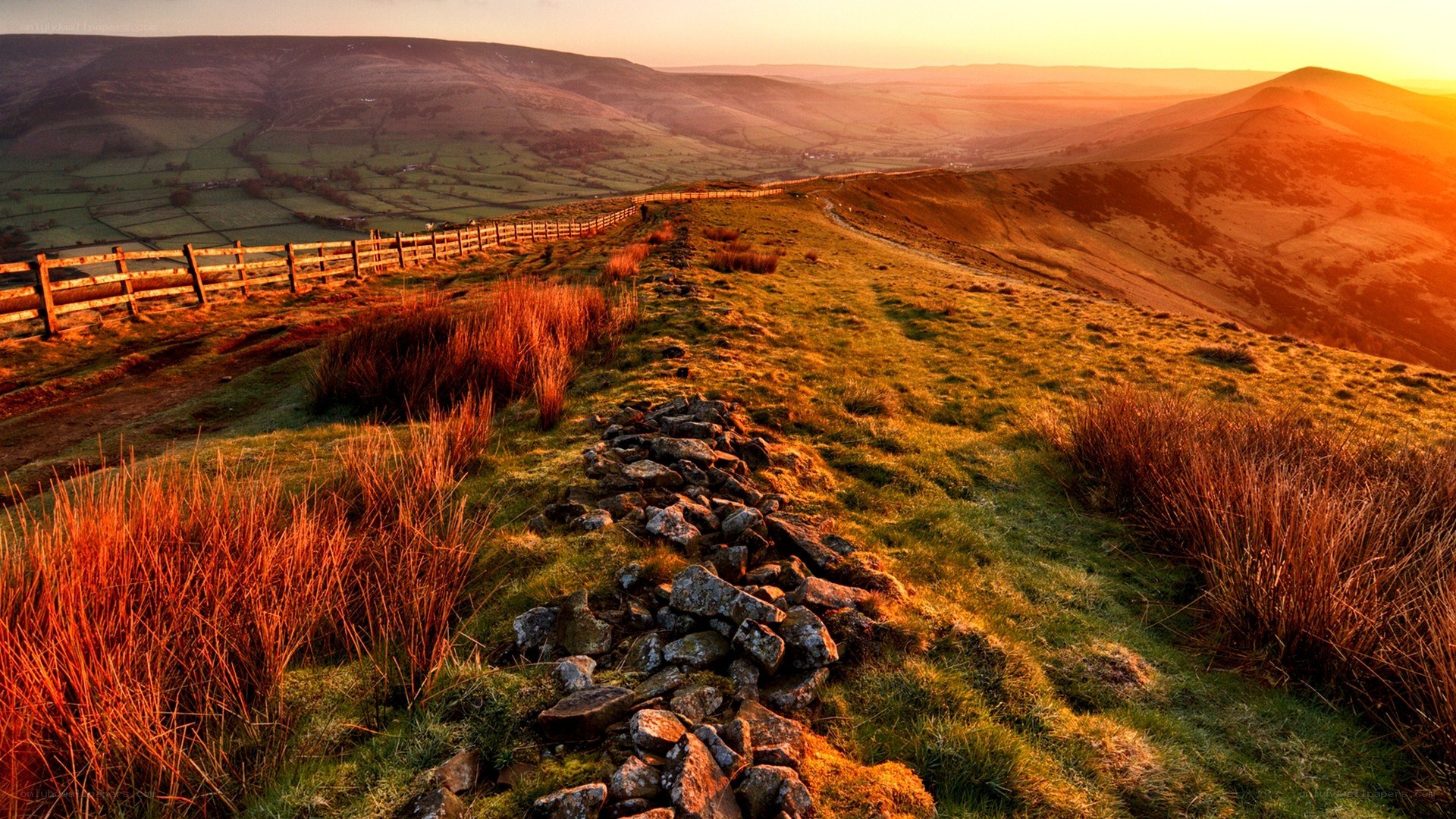Sunset over rolling hills