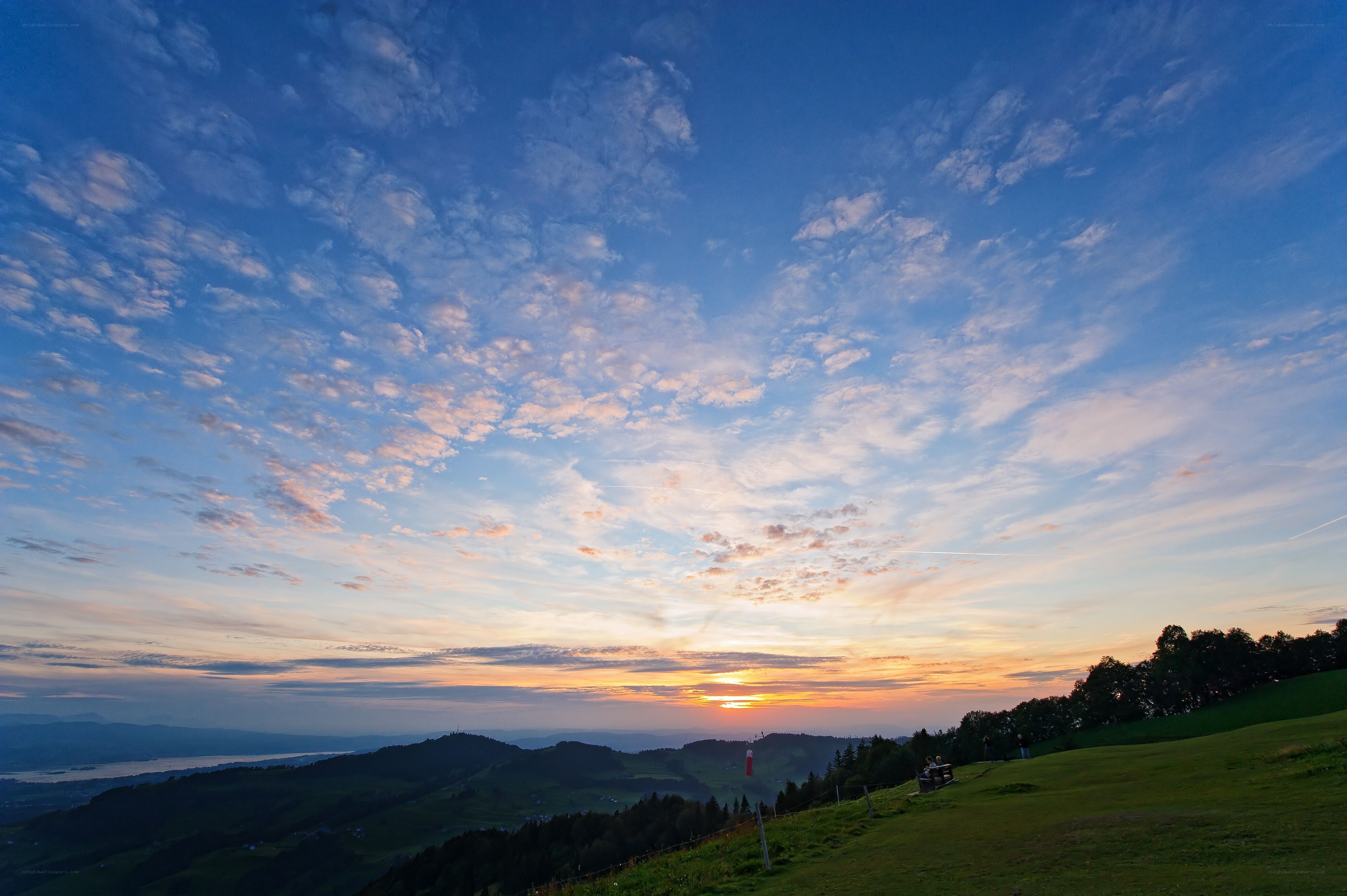 Sunset over rolling hills
