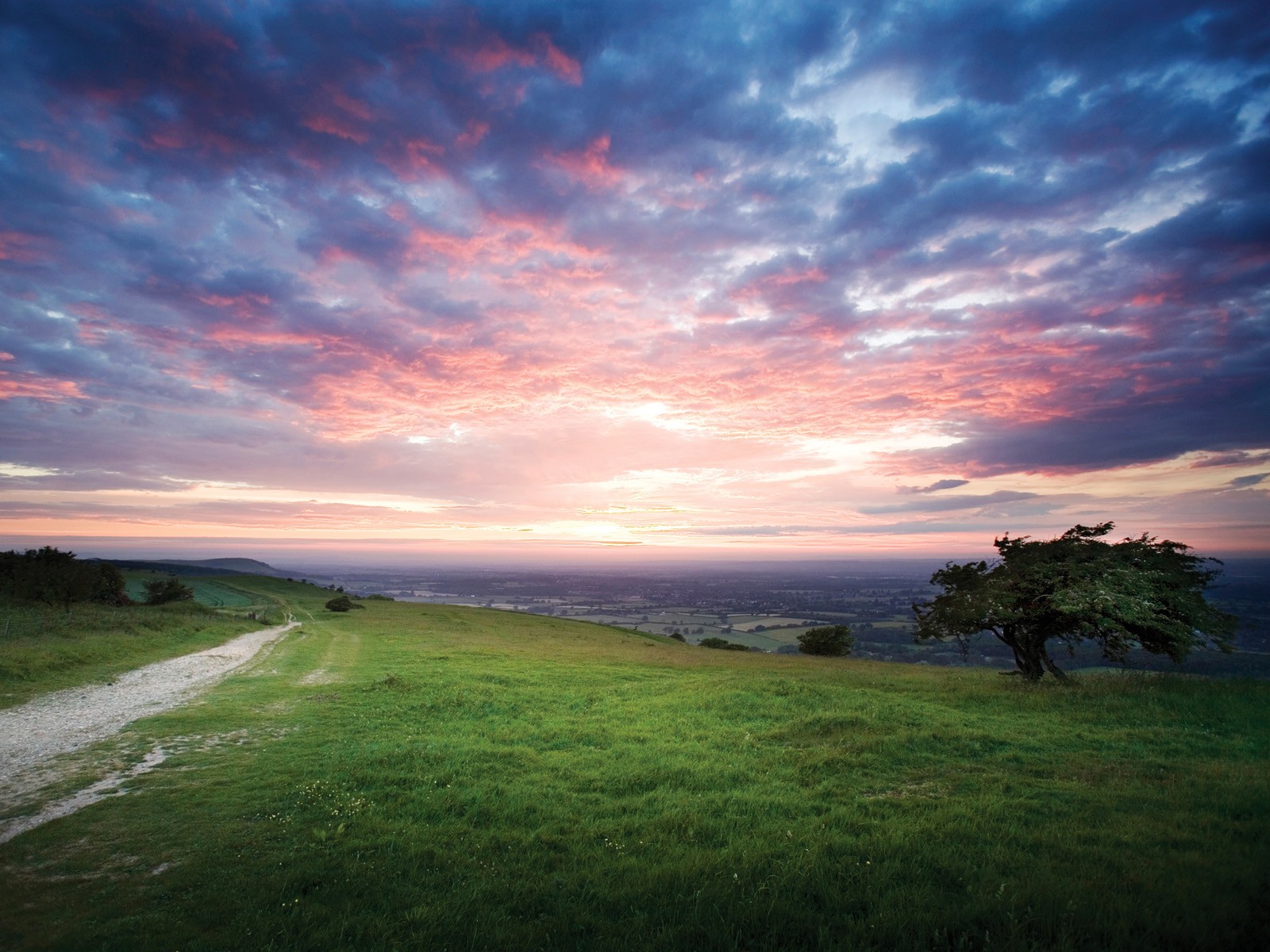 Sunset over rolling hills