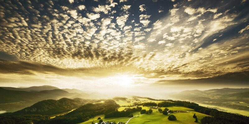 Sunset over rolling hills
