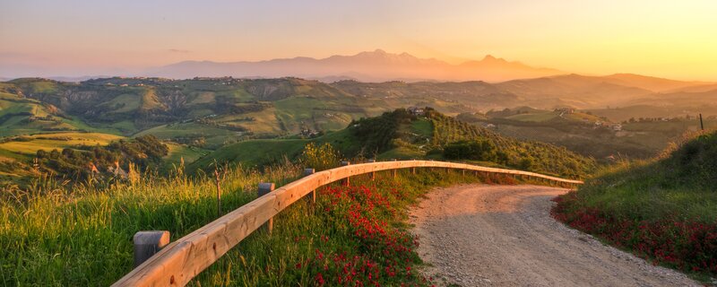 Sunset over rolling hills