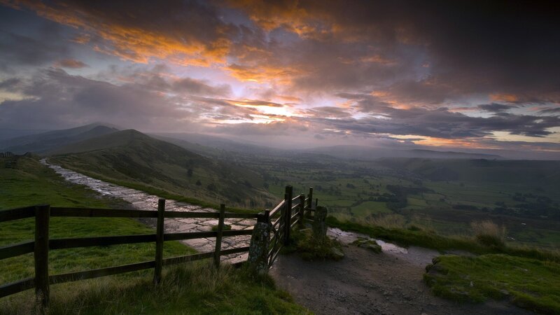 Sunset over rolling hills