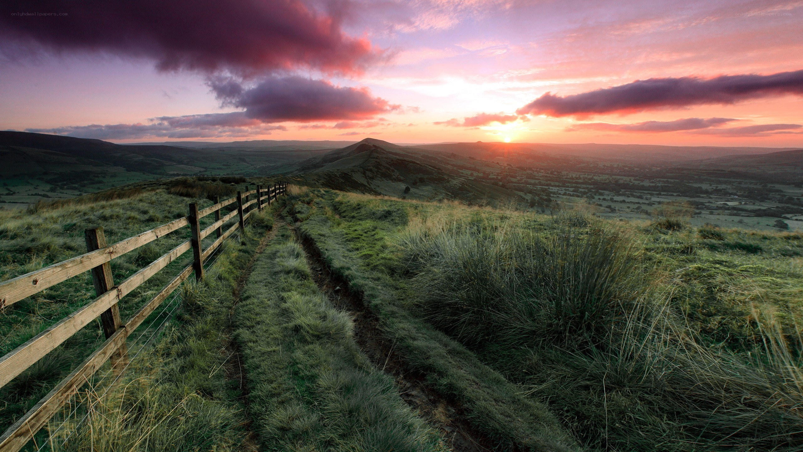 Sunset over rolling hills