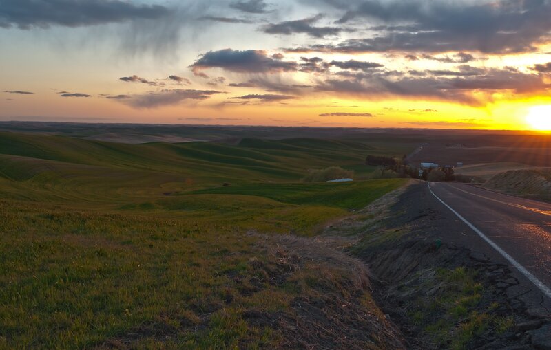 Sunset over rolling hills