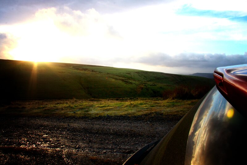 Sunset over rolling hills