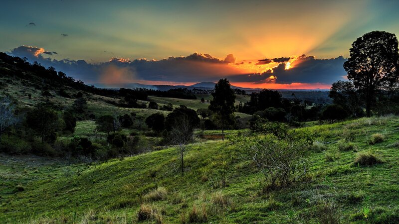 Sunset over rolling hills
