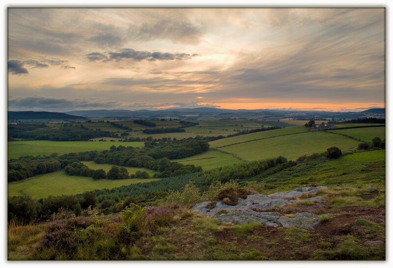 Sunset over rolling hills