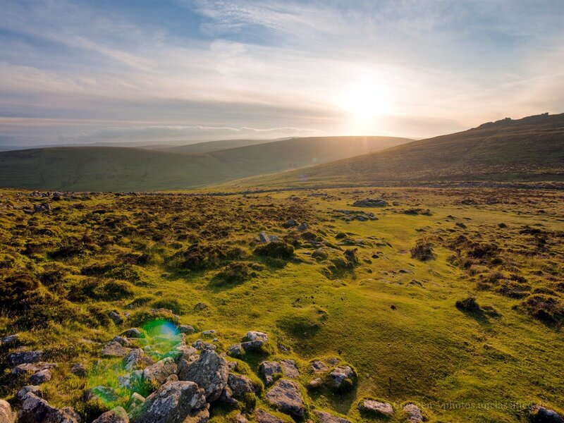 Sunset over rolling hills