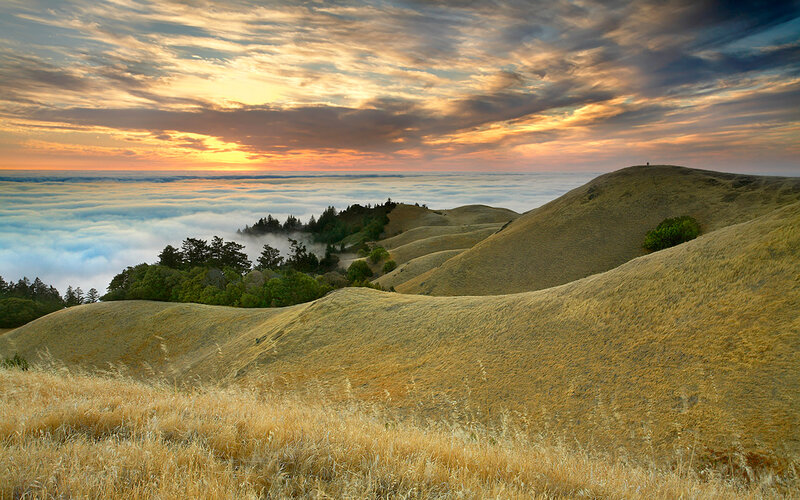 Sunset over rolling hills