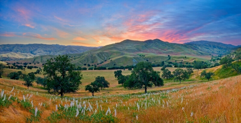 Sunset over rolling hills