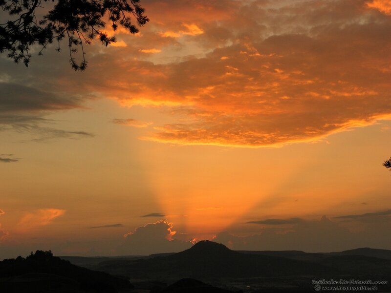 Sunset over rolling hills